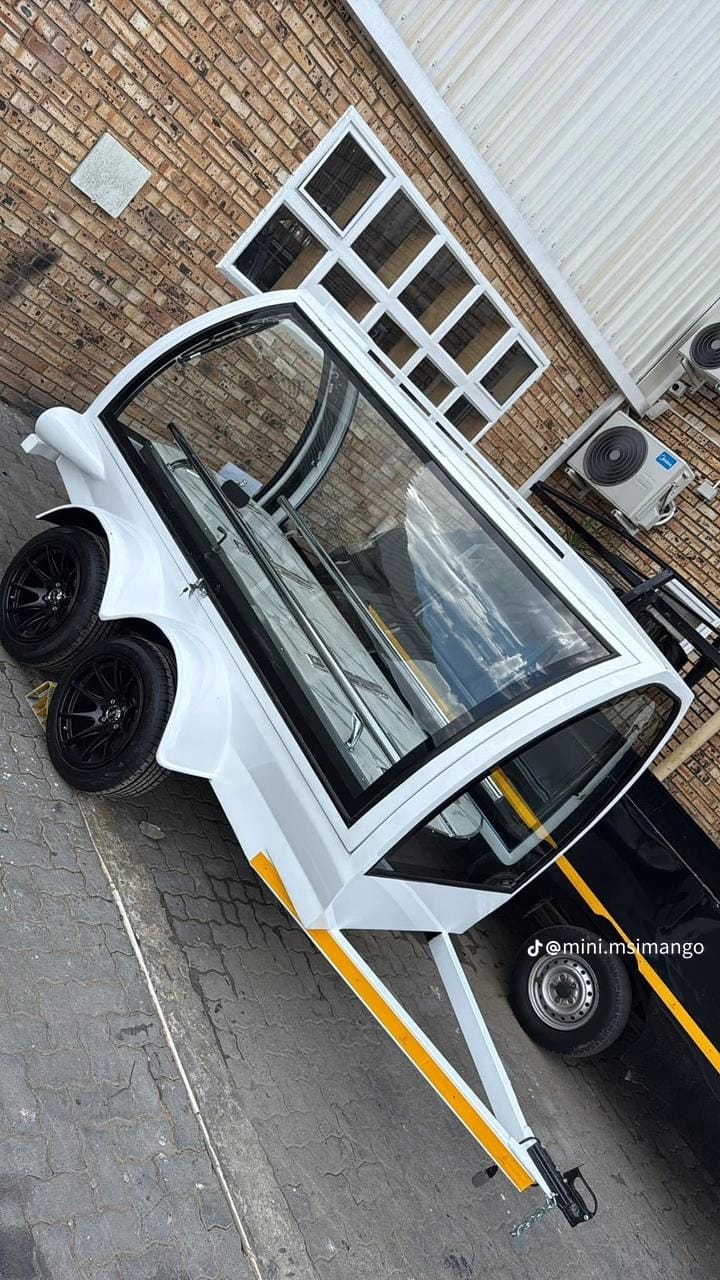 Compact mobile hearse trailer — close-up detail